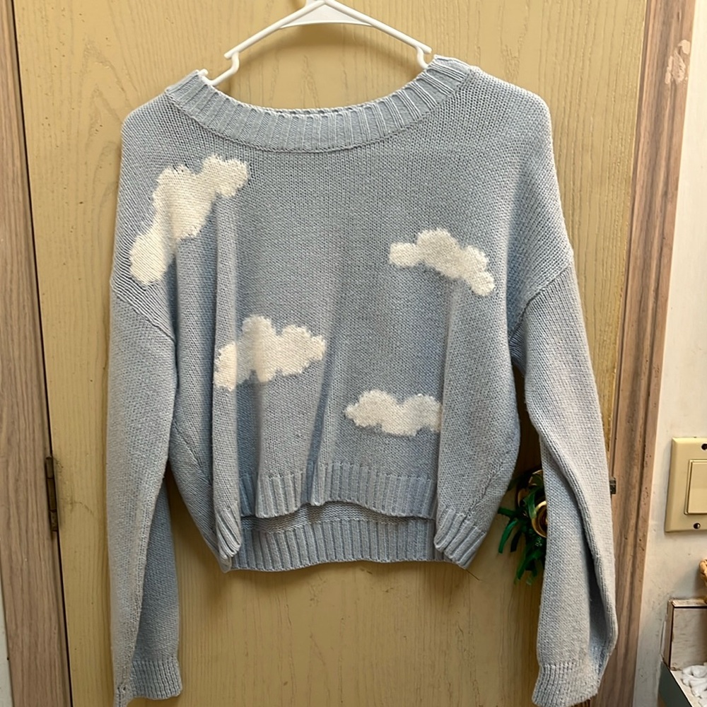Light blue sweater with clouds, size Medium